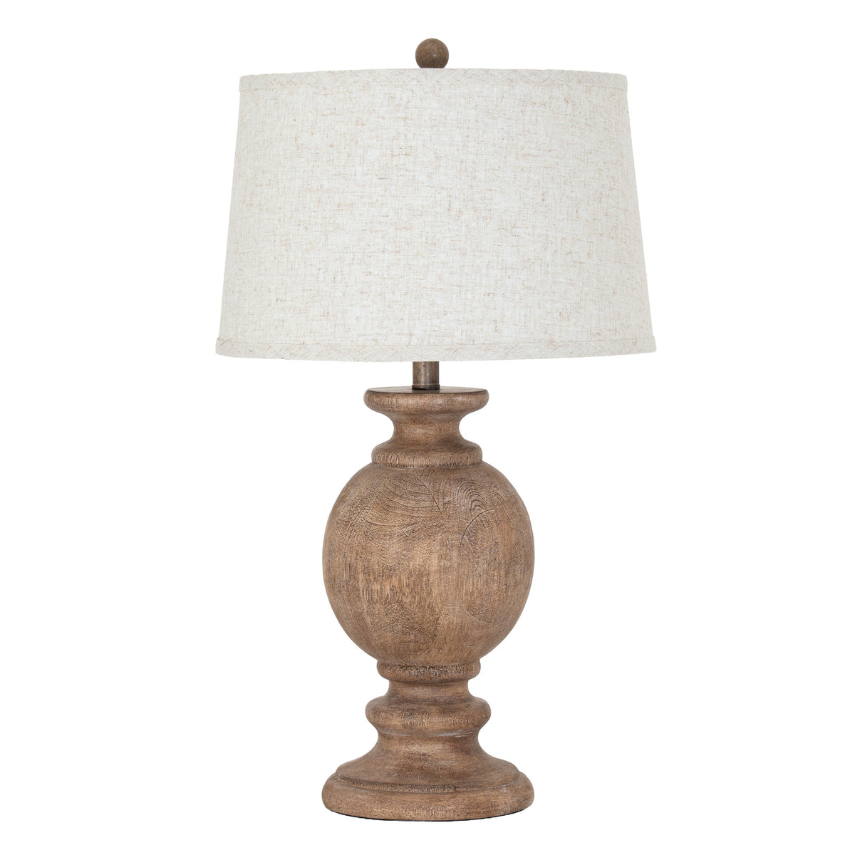 Table lamp with wooden base and white shade on a white background